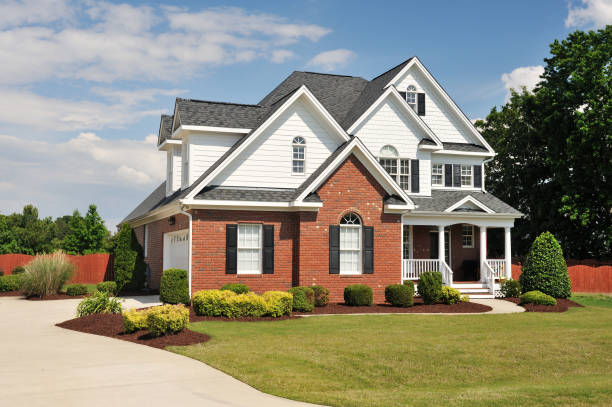 Freshly painted home with brick siding and clean finishes by an exterior painter in Duval County, FL